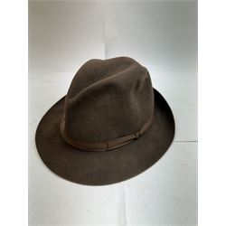 Akubra pure fur felt trilby hat, together with another trilby and two top hats, one by Woodrow and one by Dunn & Co