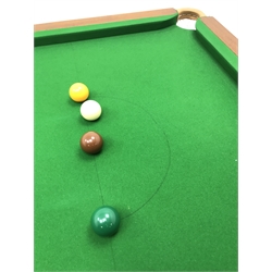 20th century mahogany framed billiard/dining table, rise and fall mechanism, four mahogany leaves, with accessories including scoreboard, balls, cues etc, W227cm, D121cm, H71cm (lowest)