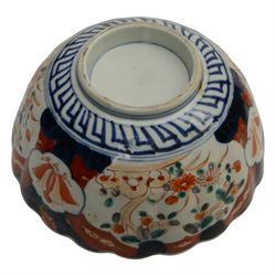 Japanese Imari dish, with scalloped edge, the internal decoration with panels of blossoming branches and a central bird, together with another imari bowl and three vases, scalloped dish H7cm