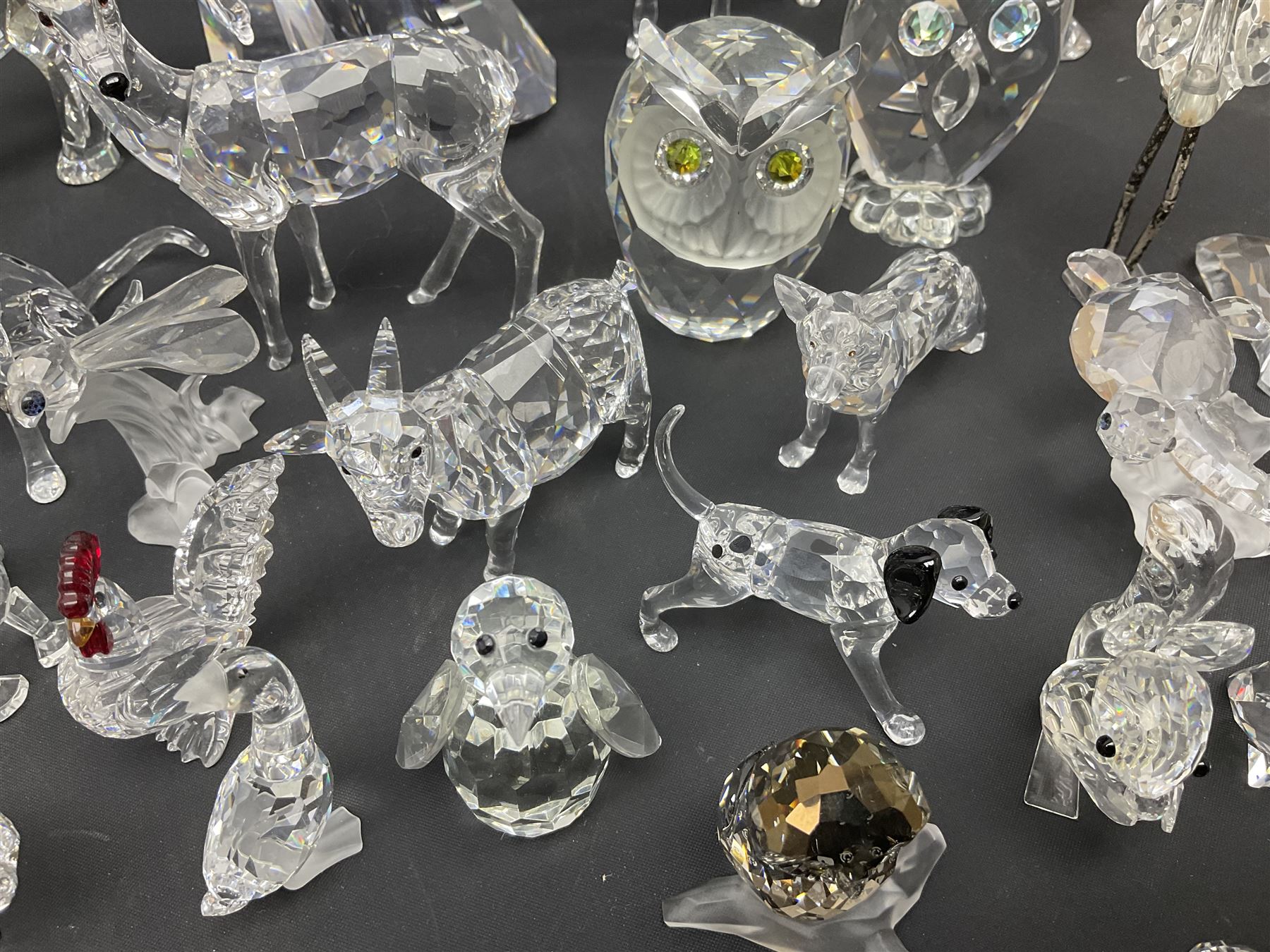 Swarovski Crystal animals, to include sheep, pigs, antelope, cockeral and hen, chicks, Pegasus, owls, giraffe, etc, together with Swarovski Crystal dancer, Isadora