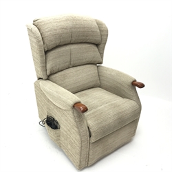 Electric reclining armchair upholstered in a beige fabric, W78cm