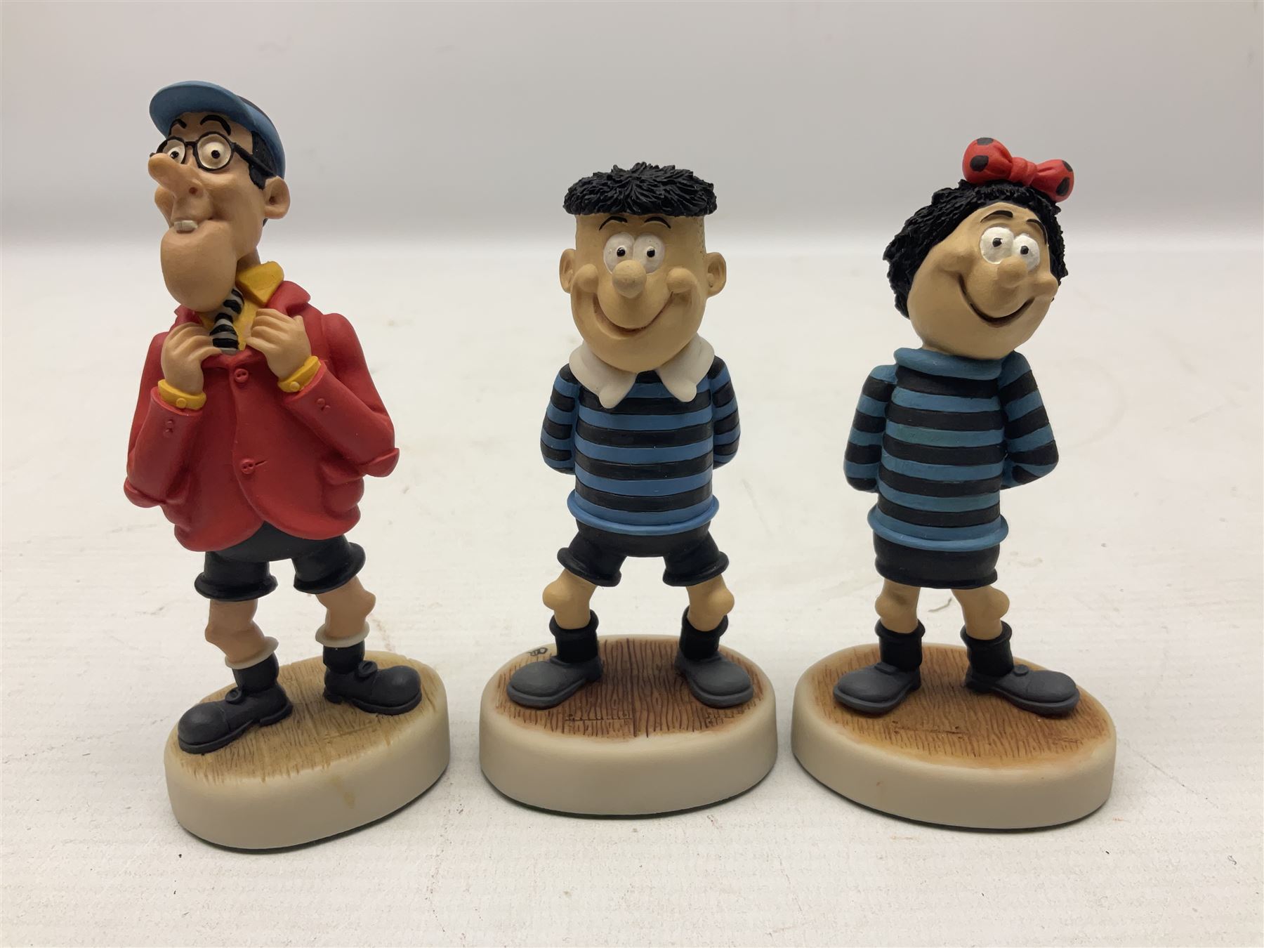 Thirteen Robert Harrop figures from the Beano Dandy collection, comprising Yo-Yo Collectors Piece 1996, Desperate Dan BD03, Cuthbert Cringeworthy BD08, Teach BD06, 'Erbert BD14, Toots BD12, Winston BD17, Fatty BD07, Dennis The Menace BD01, Dennis the Menace Fishing BD806, Sydney BD13, Wilfrid BD15 and Plug BD11