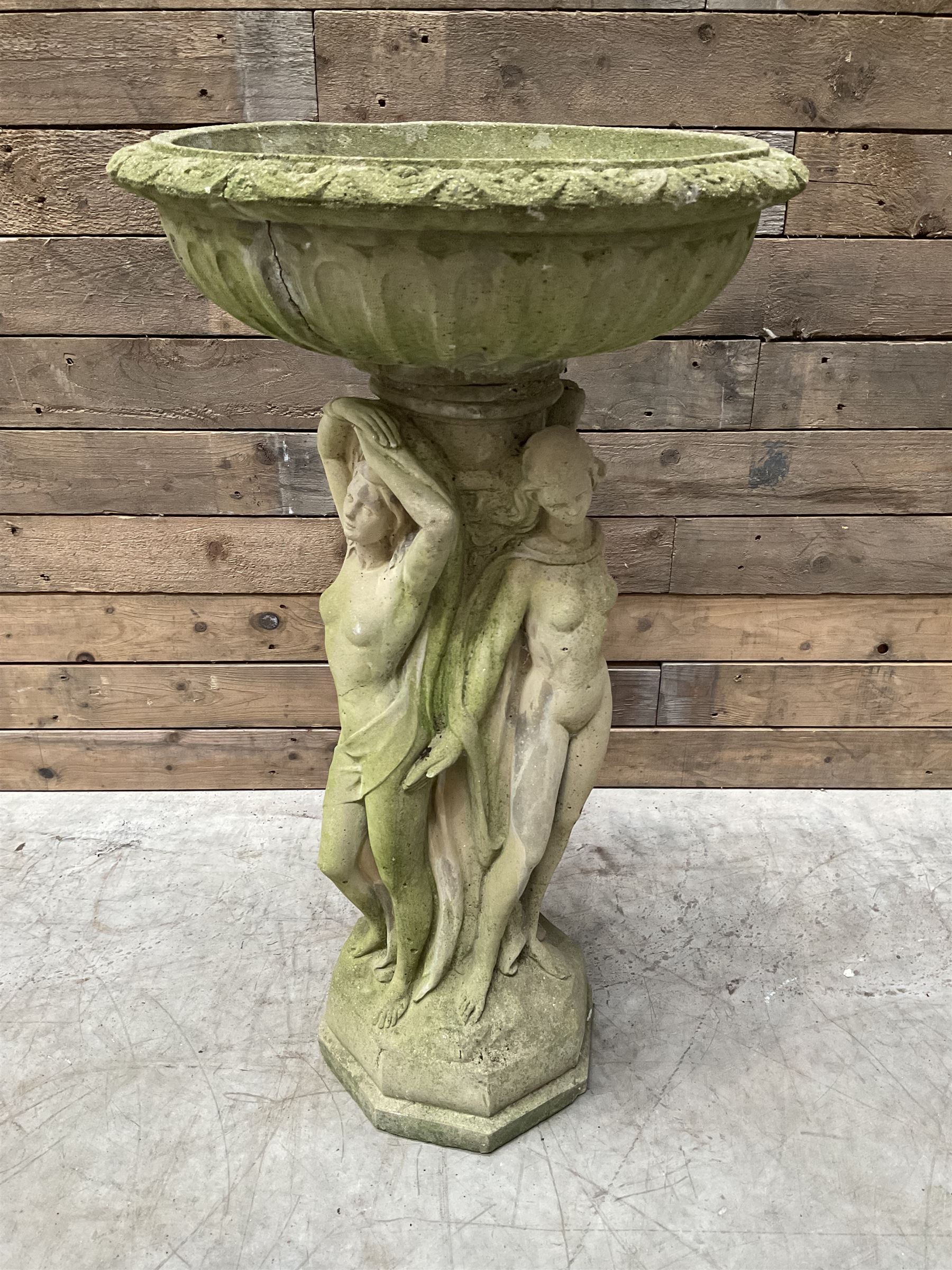 Cast stone bird bath, pedestal in the form of 'The Three Graces'