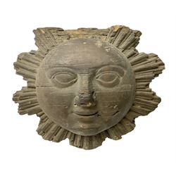 Carved pine mask of the sun, probably late 17th/early 18th century, originally a cresting, bearing Christie's lot labels, D20cm

Provenance 
Lot 161, Christopher Howe - The First Twenty Years, Christie's. 24th March 2004
