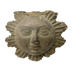 Carved pine mask of the sun, probably late 17th/early 18th century, originally a cresting, bearing Christie's lot labels, D20cm

Provenance 
Lot 161, Christopher Howe - The First Twenty Years, Christie's. 24th March 2004
