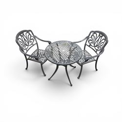 Circular aluminium garden table and pair of armchairs chairs with a pierced and scrolling backs 