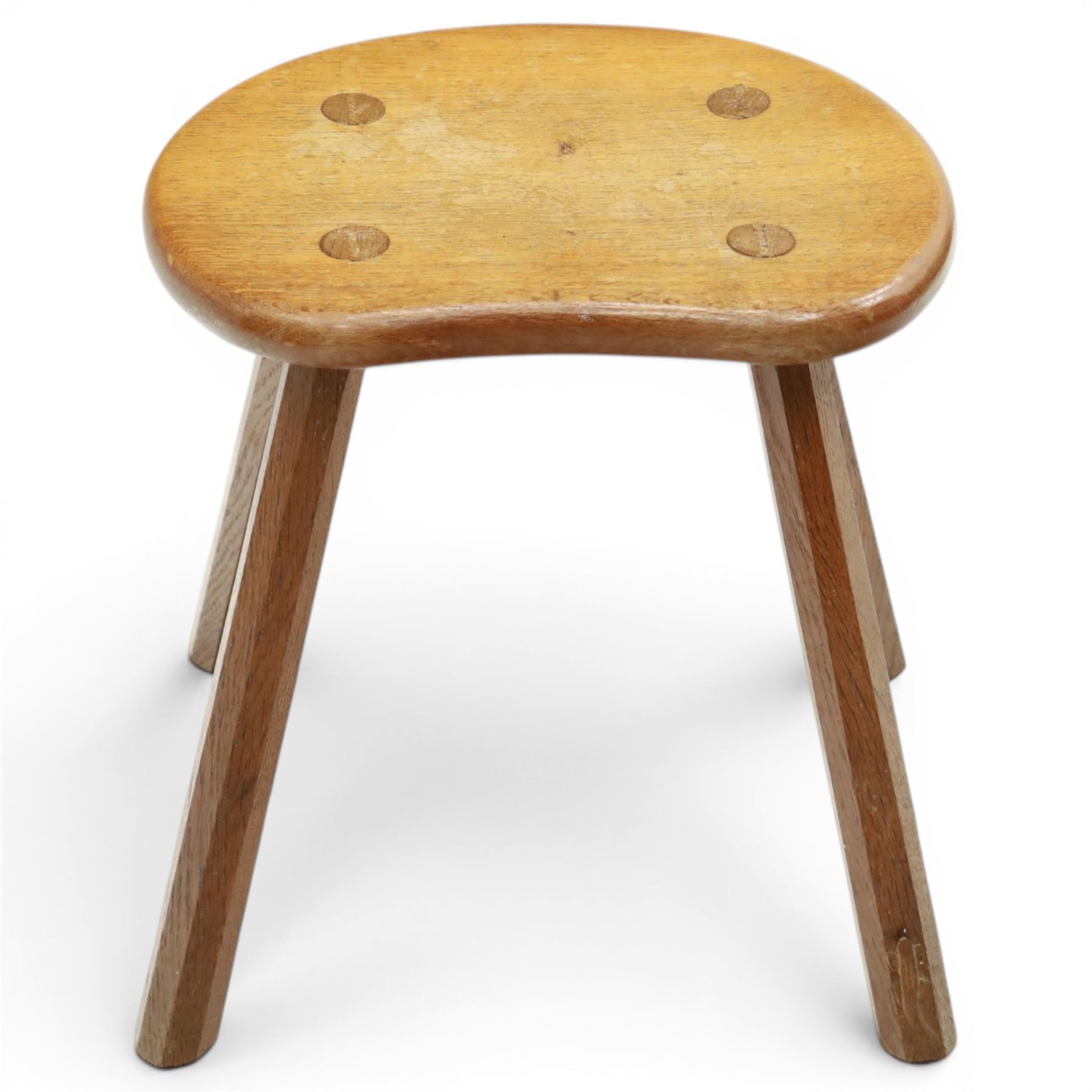 Lizardman - oak milking stool, shaped top with four octagonal supports with carved lizard signature by Derek Slater of Crayke