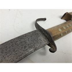 Late 19th/early 20th century Moroccan nimcha dagger-sword, the 40cm curving steel blade with engraved decoration on both sides; shaped hardwood hilt inlaid with brass, white metal wires and red coloured panels; in similarly inlaid scabbard L61cm overall