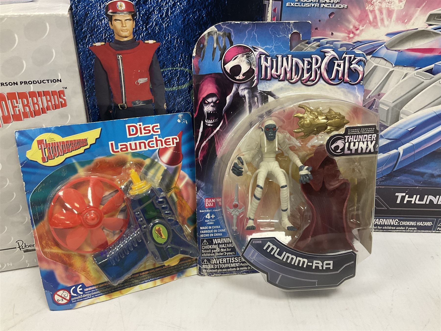 Miscellaneous toys to include Robert Harrop Fun Figurines of Captain Scarlet and Thunderbirds Braman the Robot; Thundercats Thundertank and Mumm-Ra; Stargate Mastadge Beast of Burden; various periodical issue metal figures for Star Wars, Buffy the Vampire Slayer, James Bond etc; all boxed (18)