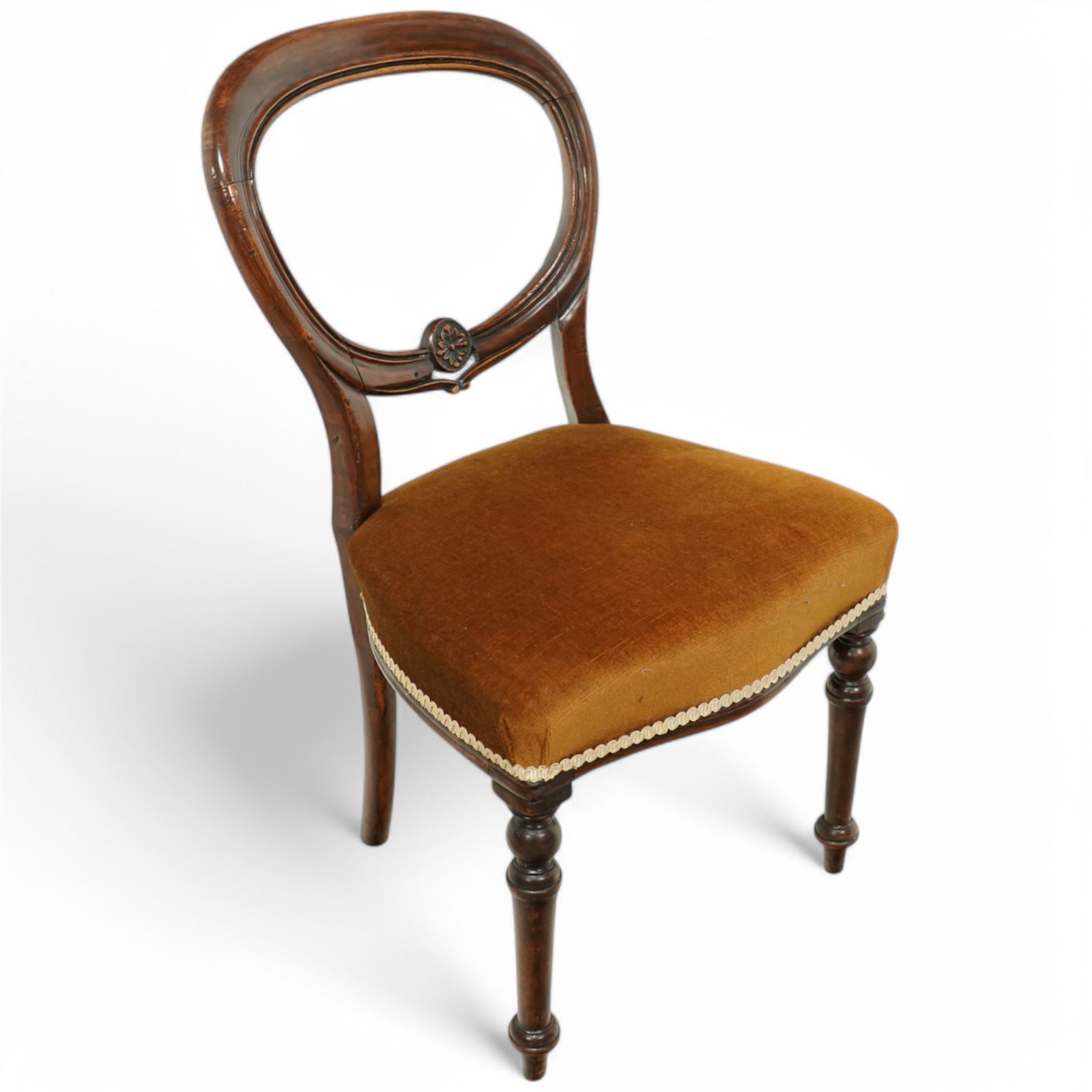 A pair of Victorian walnut balloon back parlours chairs, with carved top rail and back splat with cabriole style legs, Together with a pair Victorian mahogany balloon dining chairs