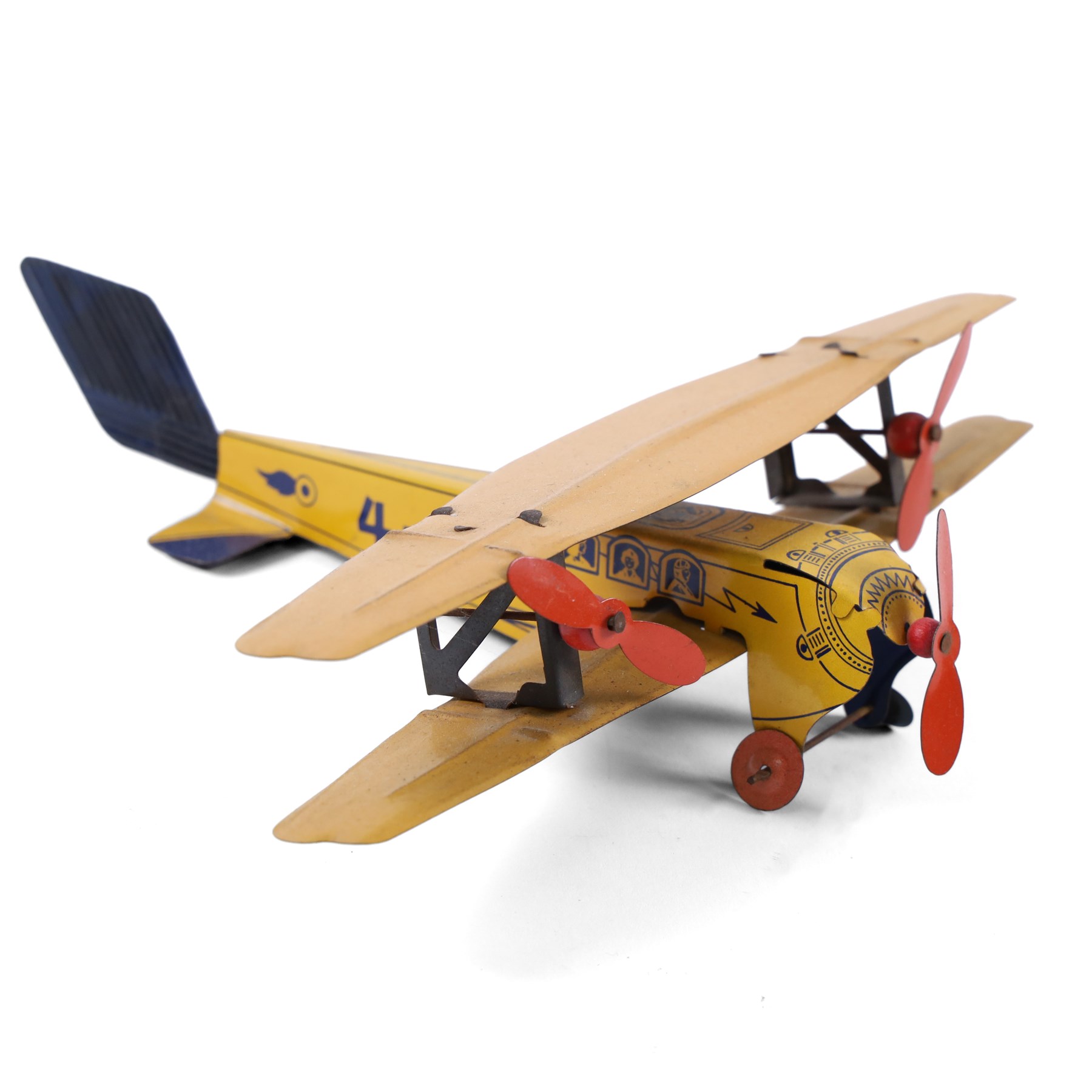 Four tinplate model aeroplanes, comprising Mettoy clockwork single-engined model no. K3520 in yellow with blue stripes and red engine cowl, Mettoy clockwork monoplane with silver and red lithographed body, Wells of London clockwork aeroplane no. 301 in green with lithographed details and a  small German bi-plane in yellow, three clockwork examples with key