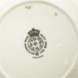 Royal Worcester porcelain cabinet plate by Alan Telford painted with apples and blackberries on a mossy bank within a gadrooned gilt border, signed Telford D15cm