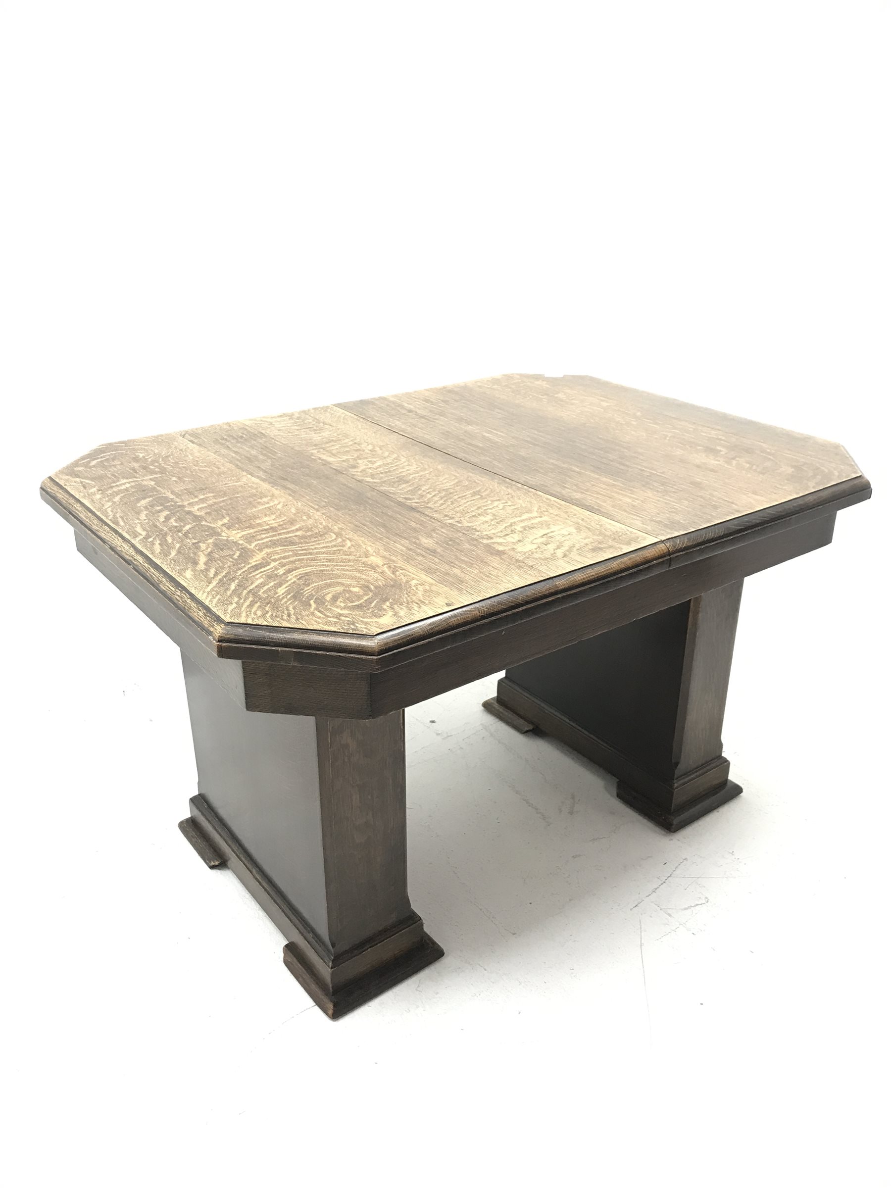 'The Celerity Patent' - Early 20th century oak extending dining table, canted rectangular moulded top with foldout leaf, on two rectangular box supports, 91cm x 122cm - 167cm, H74cm