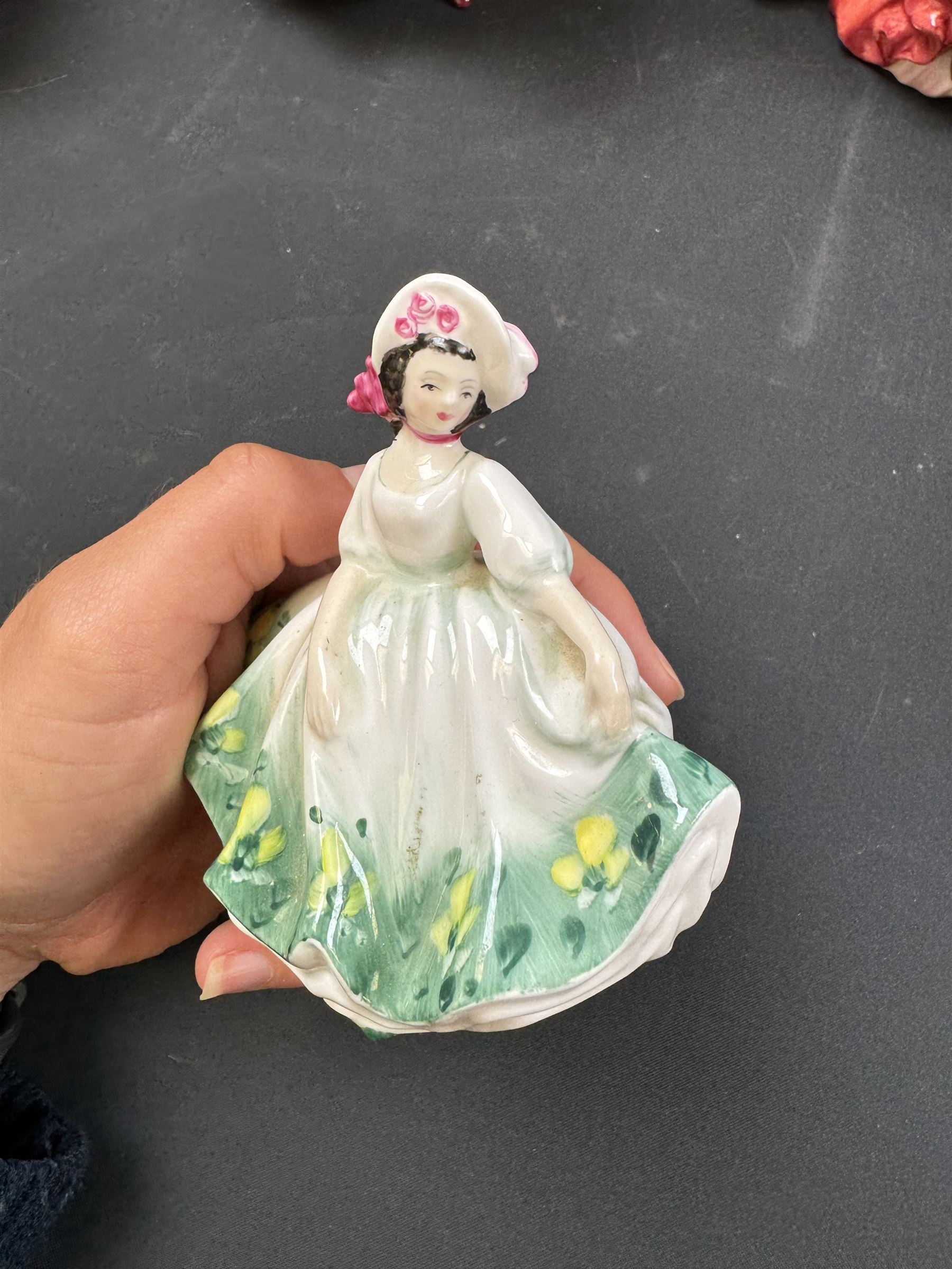 Fourteen Royal Doulton figures, including Bo Peep HN1811, Summer HN5322, Patricia HN3365 etc 
