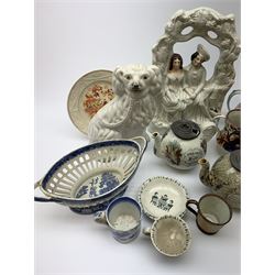 A group of 19th century ceramics, comprising agateware teapot with pewter cover, the body detailed with verse, a further example detailed A Present from Blackpool, large Wedgwood best composition mortar, two copper lustre jugs and a small cup, floral print decorated jug possibly Don Pottery, Gaudy Welsh jug, floral painted mug, Staffordshire nursery plate, teapot, and teacup and saucer, reticulated chestnut basket, Staffordshire bough group, plus a later Staffordshire style dog. (9). 