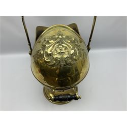 Victorian brass coal scuttle, of helmet form with turned ebonised handles, H48cm