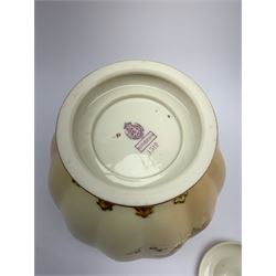 A Royal Worcester blush ivory potpourri jar and cover, of lobed form decorated with floral sprays and heightened with gilt, with printed marks beneath, RdNo112589, shape 1312, overall H19.5cm.
