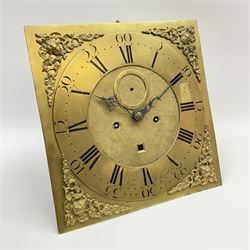 Late 18th century clock movement and dial, square brass dial with Arabic and Roman chapter ring signed 'Thos. (Thomas) Johnston, Dublin', with subsidiary seconds dial and calendar aperture, the dial set with ornate mask cast spandrels, twin train eight day movement striking on bell, with anchor escapement (34.5cm x 34.5cm, 13 1/2