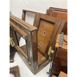 Collation of folding plate cameras of various sizes folding plate in mahogany and lacquered brass, together with camera plates and slides
By vendors repute some slide are from the Gandolfi workshop