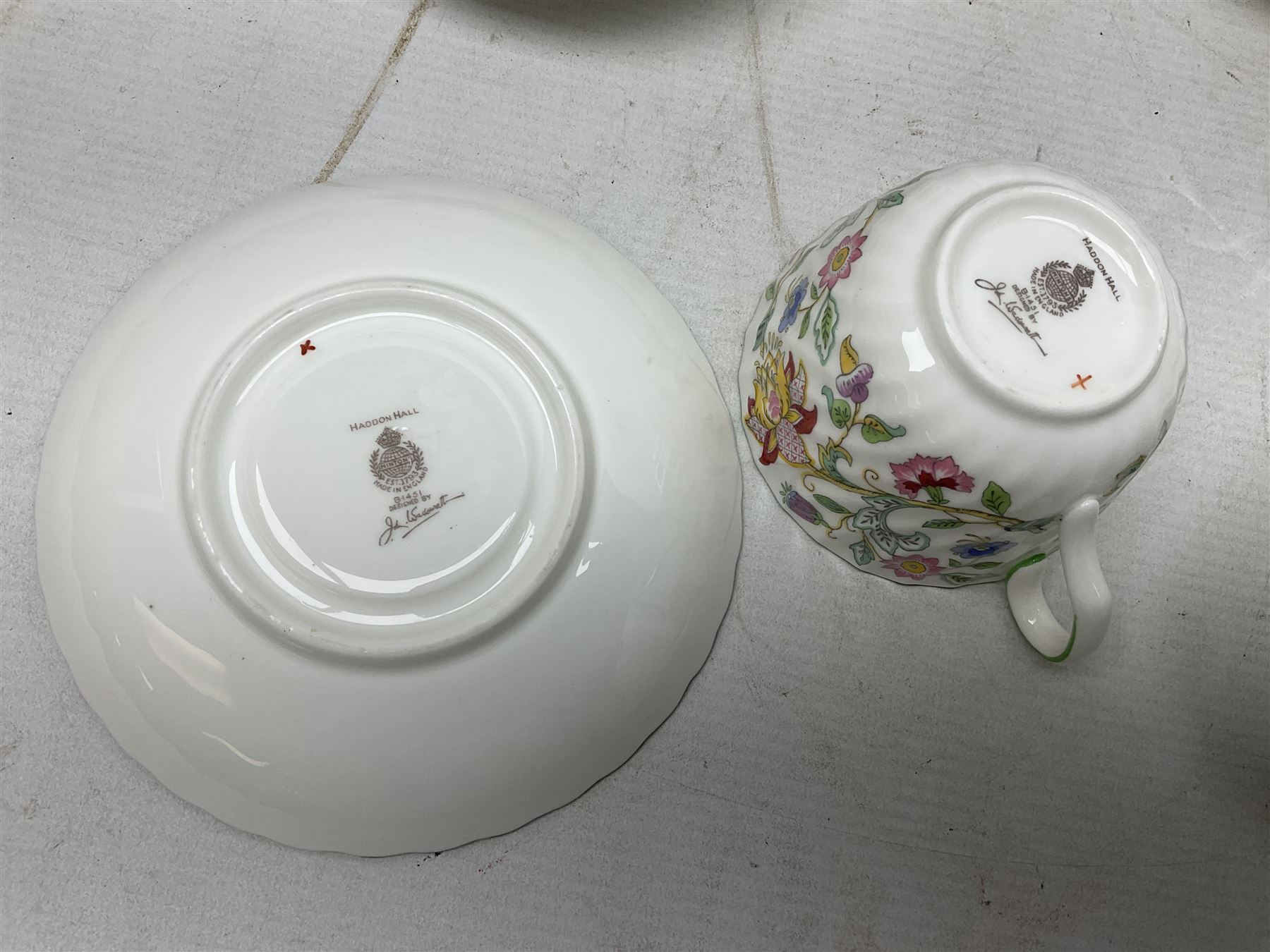 Minton Haddon Hall pattern tea wares comprising twelve teacup trios