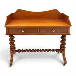 Victorian mahogany washstand with raised three-quarter back, fitted with two frieze drawers with glass handles, raised on spiral turned supports with splayed supports and castors united by barley-twist stretcher