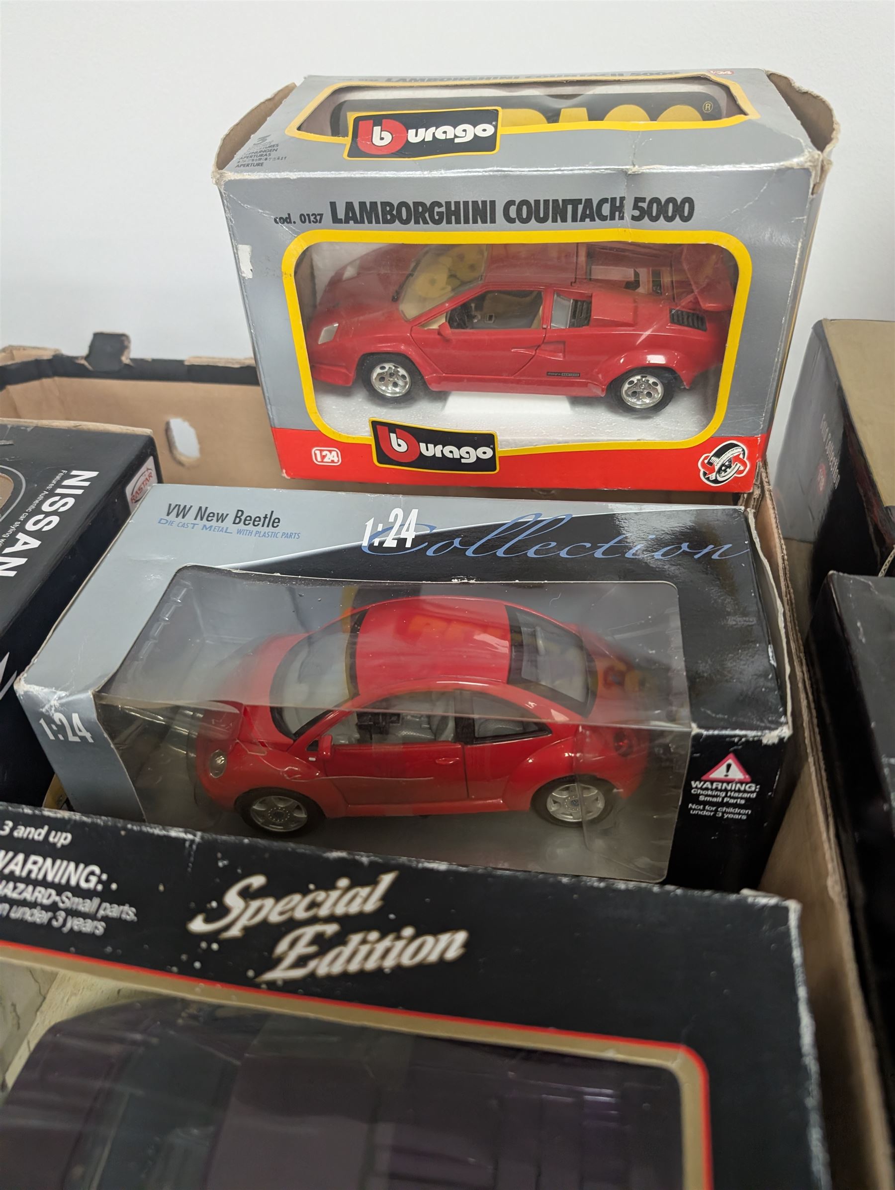 Fourteen 1:18 and 1:24 scale diecast model vehicles, including Classico Ferrari 1972 312, DX RC Lamborghini Gallardo, Maisto Silver Edition Porsche Boxter, , Bburago Williams Fw14, Bburago Ferrari 641/2, etc all boxed