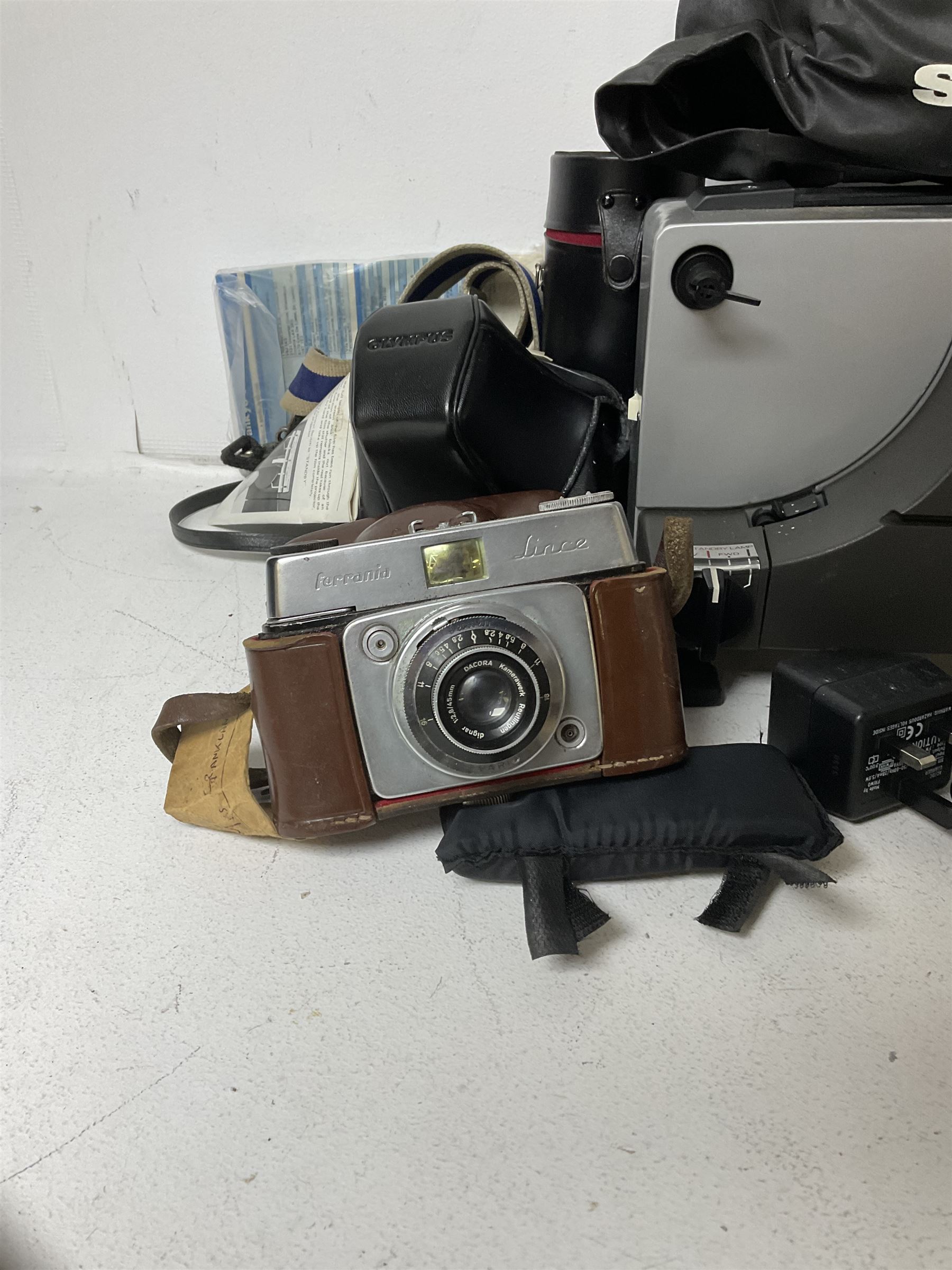 Sankyo Dualux-2000H projector, with cover, together with two vintage camera cases, etc