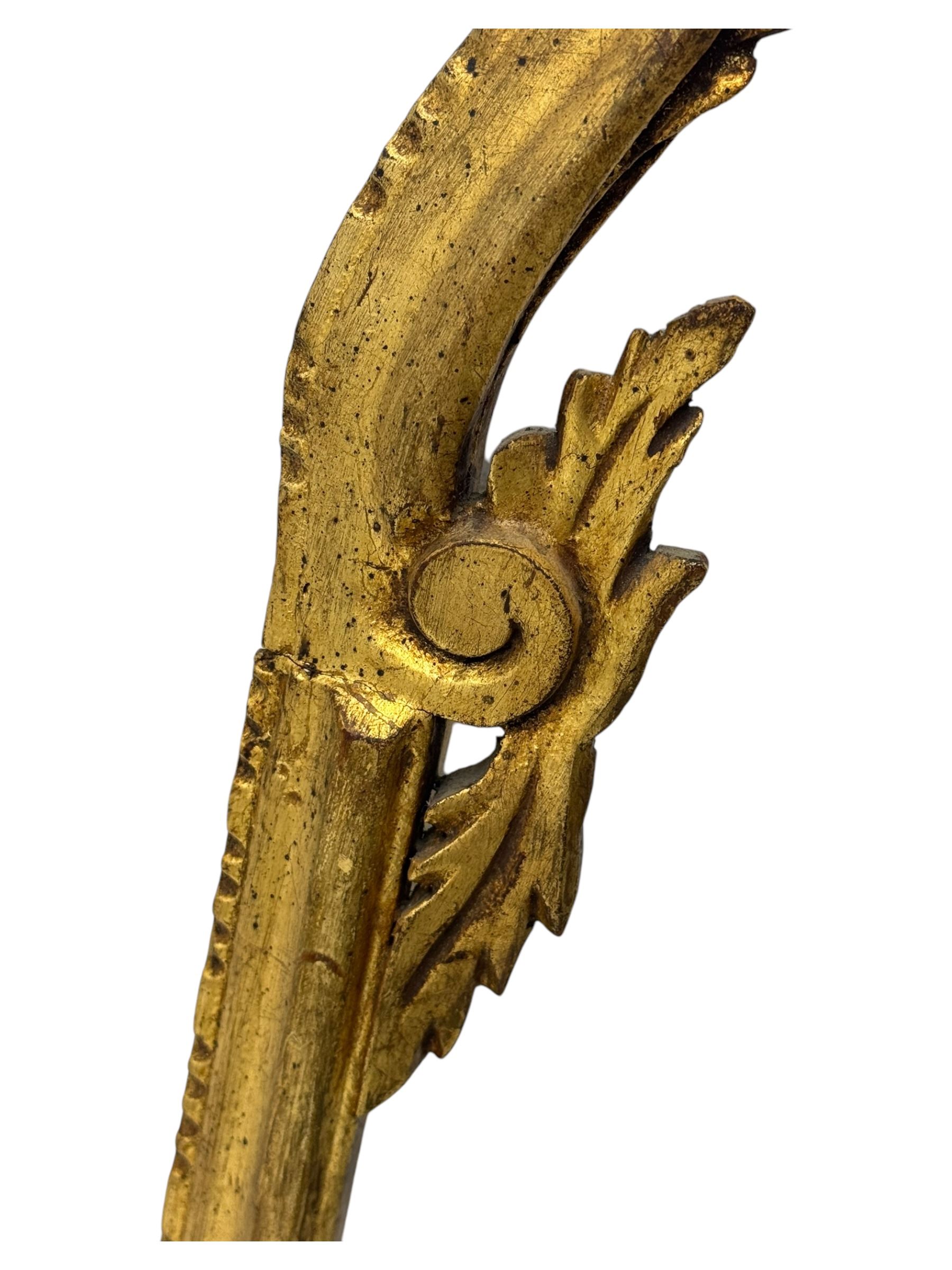 18th century design gilt framed wall mirror, within a pierced and scrolling foliate frame, leaf sprays and flowerhead cresting