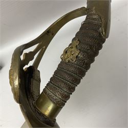 19th Century Prussian Infantry Officers 1889 pattern sword, the 80cm double fullered blade with makers mark to the ricasso for Weyersberg Kirschbaum & Co; curved brass top pommel with brass wire bound fish skin grip applied with crowned Wilhelm II monogram; leather finger loop; fixed cross guard with Imperial eagle and double bar knucklebow; in polished steel scabbard with two suspension rings L99cm overall