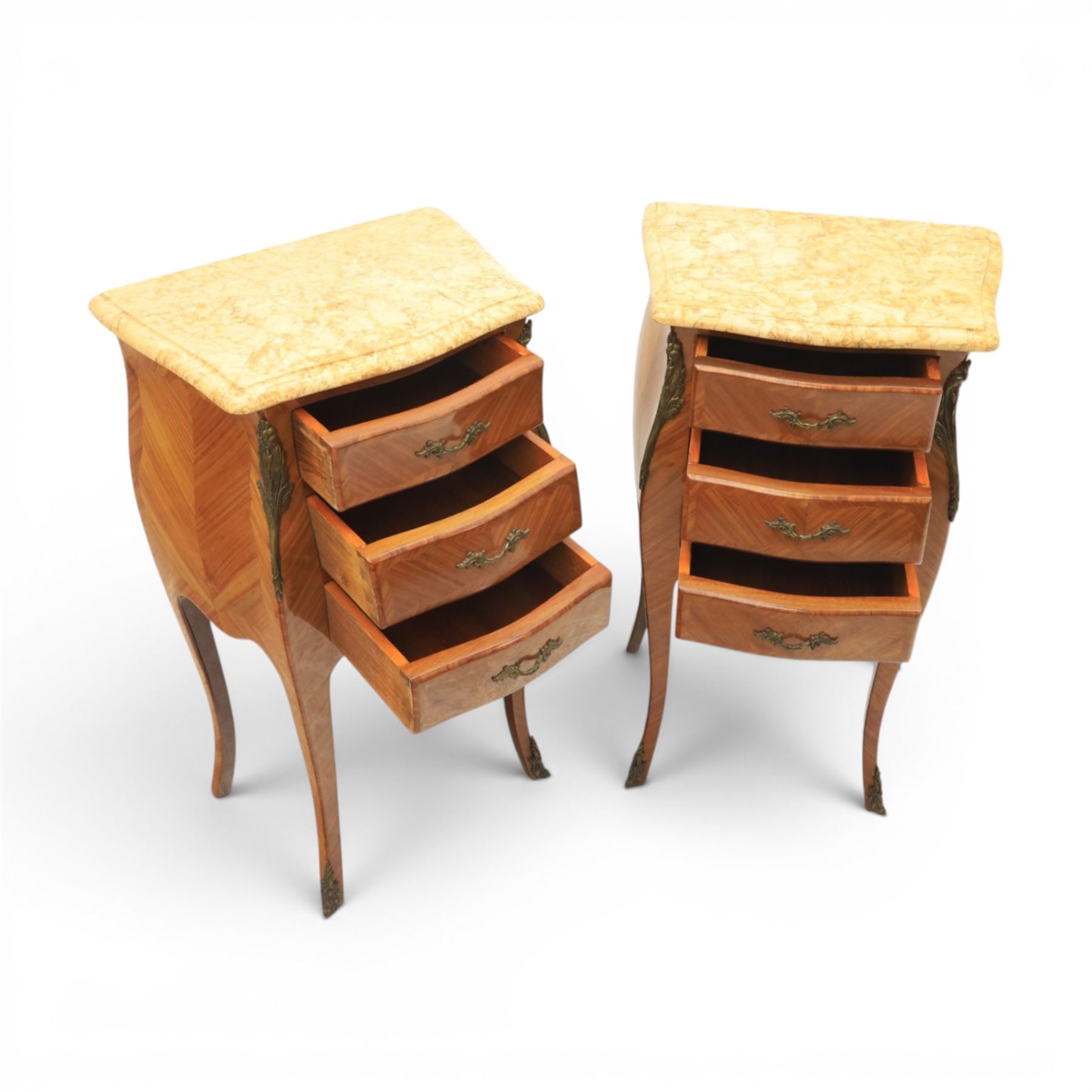 Louis XV style pair of kingwood and marquetry bedside chests, with shaped marbled tops, fitted with three drawers, with gilt metal mounts, raised on cabriole legs
