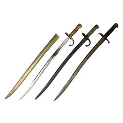 French Model 1866 sabre bayonet with 57cm fullered steel curving blade; in steel scabbard L71cm overall; another Model 1866 sabre bayonet lacking scabbard; and British Pattern 1856 sword bayonet (no scabbard) (3)