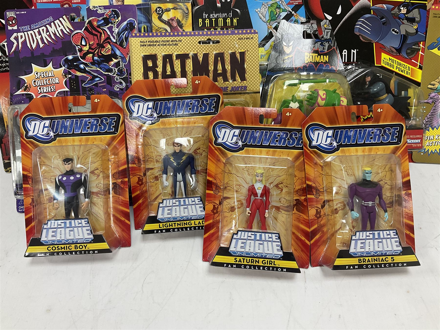 Twenty-four carded action figures of Batman (11) and other Super Heroes including Spiderman, DC Universe, Xyber 9 etc; all in unopened blister packs (24)