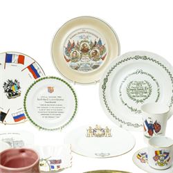 WWI items including Goss plate decorated with WWI allied flags, Grimwades Victory 1918 plate from the Peter Higginc collection, Till & Sons Kitchener plate, Lloyd George plate  inscribed 'Made by the Girls of Staffordshire during the Winter of 1917...'various other plates, beakers and character jugs and a WWII Copeland Spode U.S.A. design Winston Churchill jug