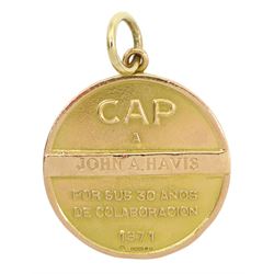 9ct gold presentation medallion, the front depicting a male with Spanish pantaloons carrying a rope, hallmarked