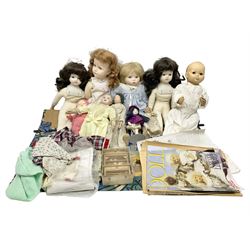 Collection of Victorian and later dolls, mostly soft bodied with ceramic heads, together with a dolls house miniature welsh dresser and doll collectors magazines and an applique village scene wall hanging