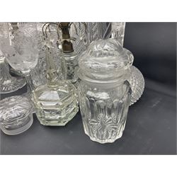 Collection of 18th century and later cut glass, including a pair of Victorian onion shaped decanters with elongated necks and hobnail cut decoration, together with a similar jug, of tapering form with C handle and an Georgian cut glass jug, with stepped decoration to neck and square cut decoration to body, tallest jug H30cm
