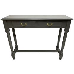 Grey painted side table, moulded rectangular top over two drawers, on turned supports united by stretcher