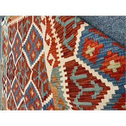 Choli Kilim red and beige ground rug, repeating border