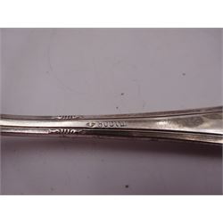 Five German silver table spoons, each with foliate border and engraved initial to terminal, marked 800 with crescent and crown mark, together with a matching set of five table forks