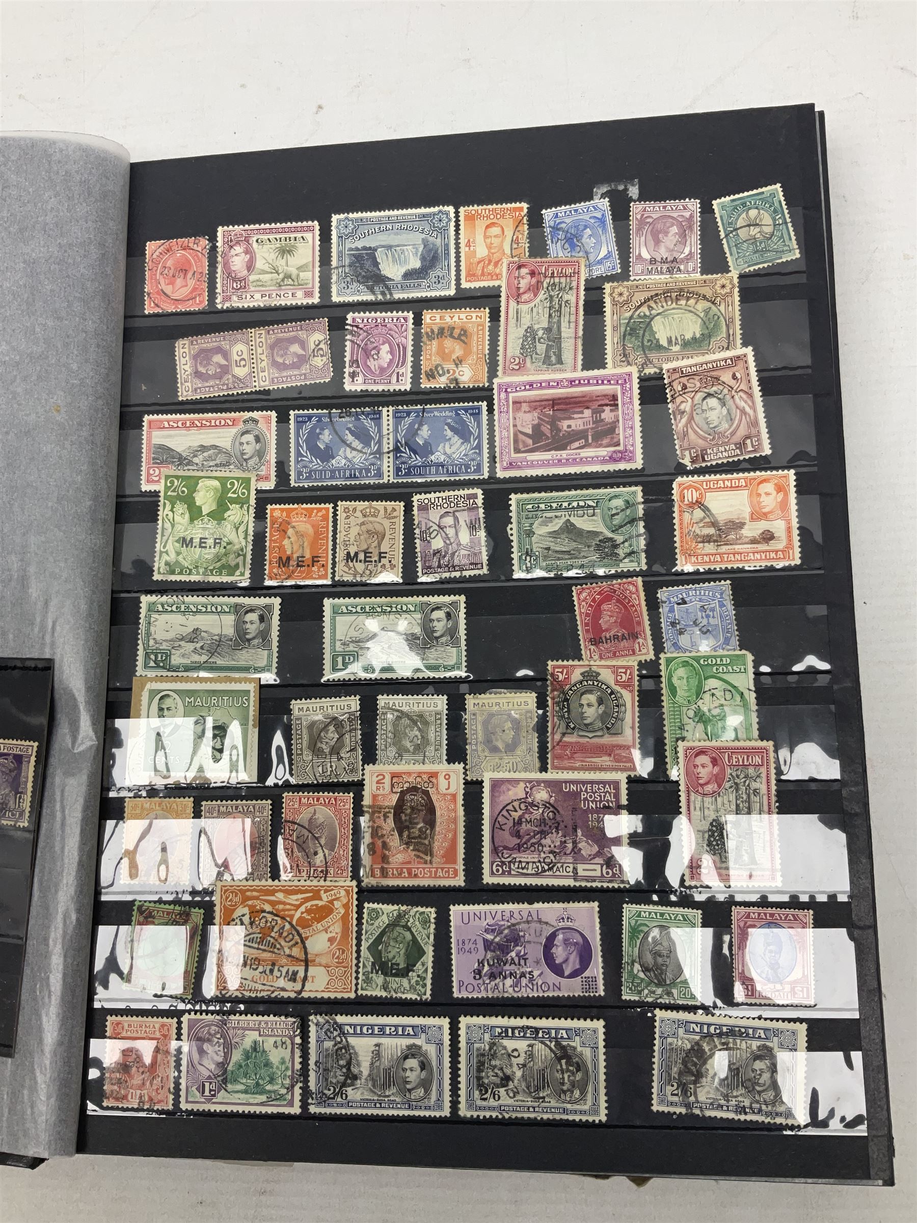 Stamps including St Helena, Fiji, Southern Rhodesia, Malaya, Bermuda, Queen Victoria and later Ceylon, various Universal Postal Union 1949 etc, housed in six albums/folders