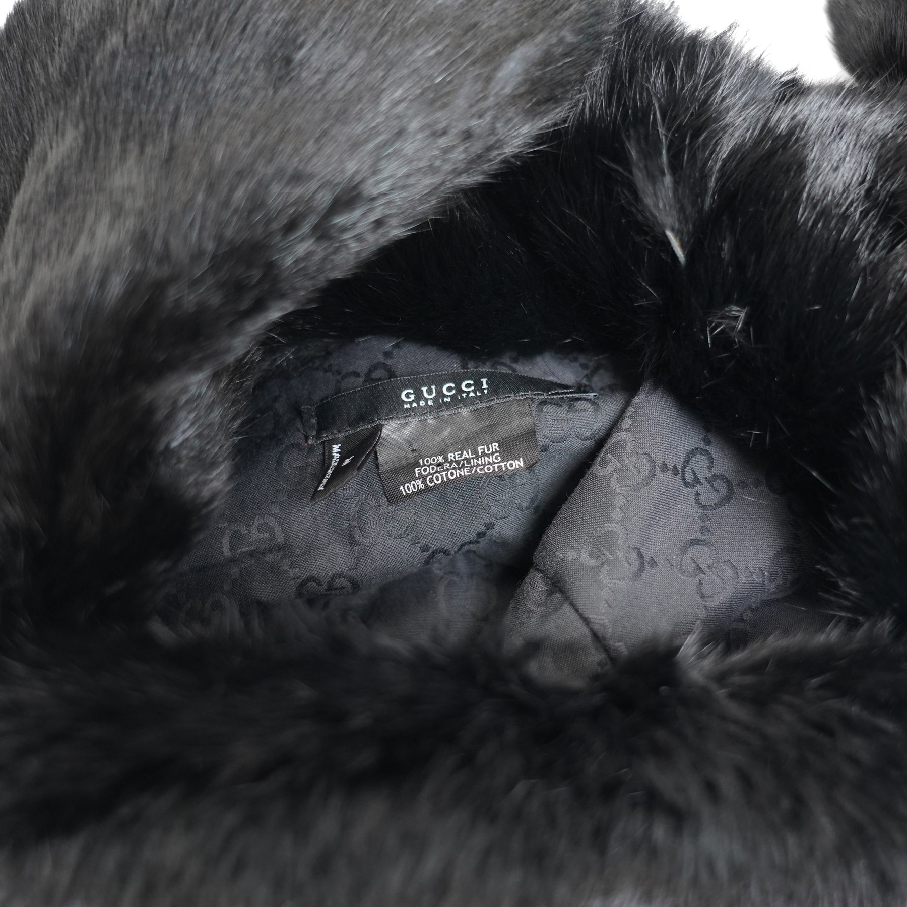 Gucci - black real fur trapper hat, with ear flaps, cotton monogram lining and logo label, size M, with dust bag