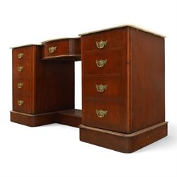 Victorian mahogany pedestal dressing table, shaped white marble top over central frieze drawer, flanked by two pedestal cupboards with four dummy drawer fronts and ornate brass handles, recessed kneehole with platform base, on plinth supports