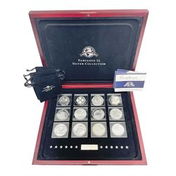 'The 2012 Fabulous 12 Silver Coin Collection' including Queen Elizabeth II Britannia one ounce silver two pound coin, Queen Elizabeth II Canada Maple Leaf one ounce silver five dollar coin, Queen Elizabeth II Australian Koala one ounce silver one dollar coin, Austrian Philharmonic one and a half euro coin, etc., in wooden presentation case