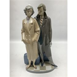 Lladro figure, Sad Parting, modelled as a man and woman with suitcases, sculpted by Francisco Catalá, with original box, no 5583, year issued 1989, year retired 1991, H33cm
