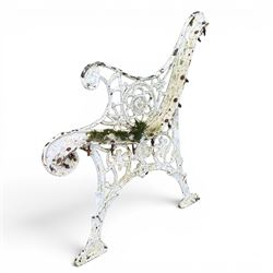 Pair of ornate painted cast iron bench ends, painted in white finish