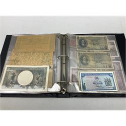 World banknotes, including Queen Elizabeth II The States of Jersey one pound 'DB202703', five pounds 'BB527762' and ten pounds 'AB651481', reserve bank of New Zealand two dollars '1L3 741894', King George V Straits Settlements one dollar 1st January 1935 'F/83 28924', various Bank of England notes etc, housed in two ring binder albums