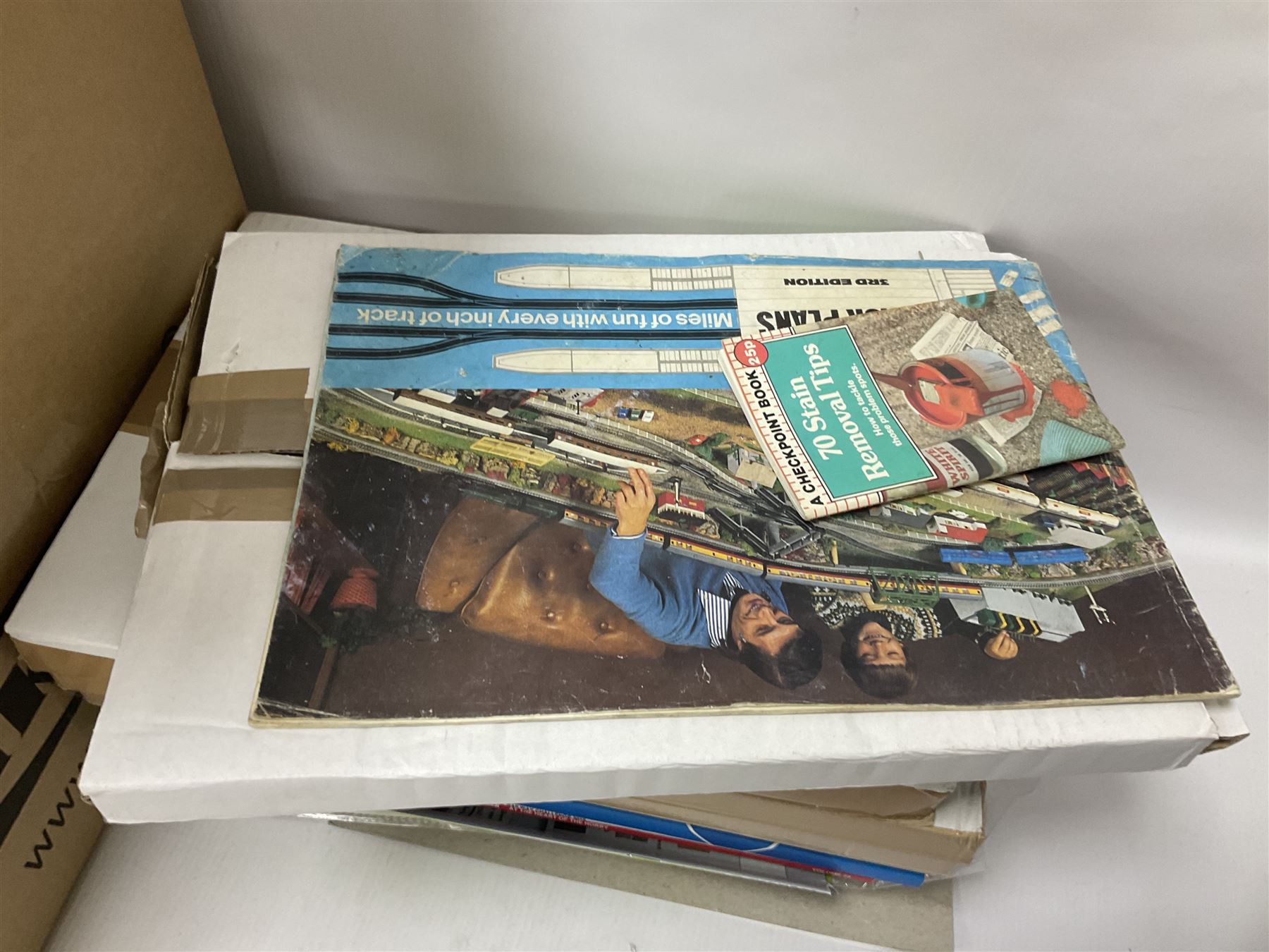 Extensive collection of scratch built buildings for use on ‘00’ gauge model railway layout, small amount of accessories and tools with a quantity of railway magazines and leaflets, in three boxes 