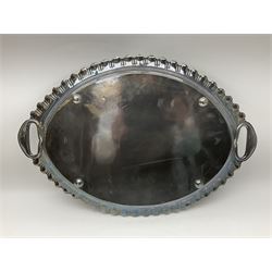 Oval silver plate twin handled tray, egg and dart edge, engraved with floral springs surrounding an central inscription, L65cm