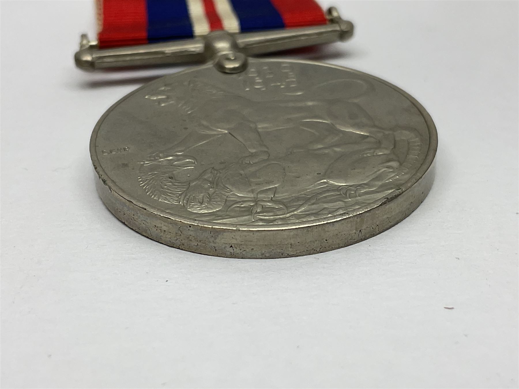 WW1 group of three medals comprising British War Medal, Victory Medal and 1914 Star awarded to 8328 Pte. G. Shaw Yorks: L.I.; on hanging bar with WW2 1939-1945 War Medal and WW1 ribbon bar with rosette to 1914 Star ; all with ribbons; and WW2 1939-1945 War Medal with ribbon