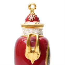 Early 20th century Royal Worcester vase and cover by Harry Davis, painted with a distant view of a castle and a couple resting on a red ground, heightened profusely with gilt, shape number 2422, printed marks in green to base, H25cm